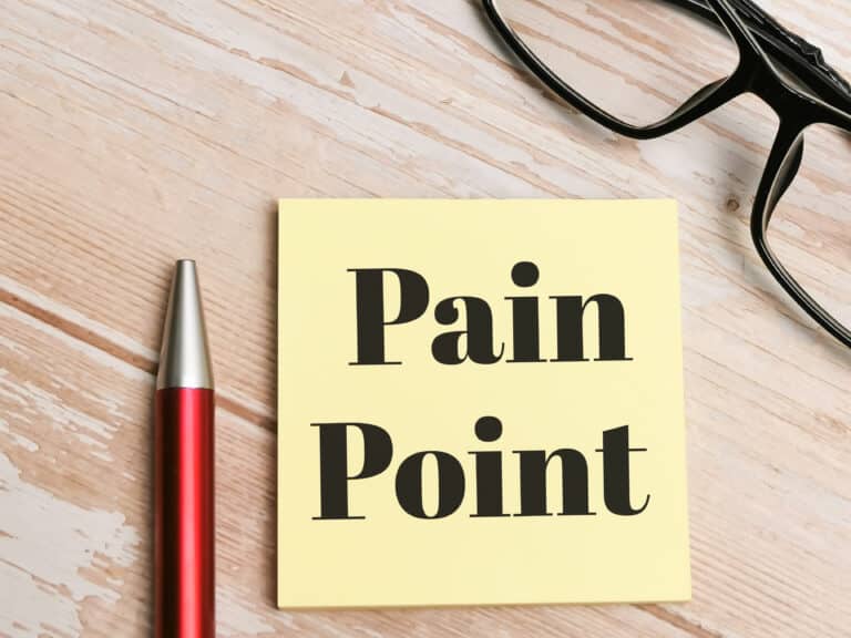 A note that says pain point on it.